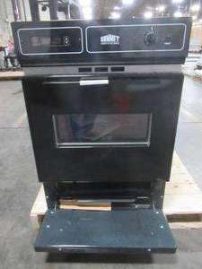 lot 306 image: SUMMIT 24 in. Single Gas Wall Oven in Black, TTM7212KW - Slight Dent on Top - ELECTRONICS WORK.