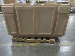 lot 409 image: Assembled 60x34.5x24 in. Sink Base Kitchen Cabinet in Unfinished Beech - CrackedDamaged LH Side.