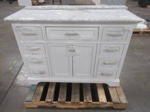 lot 312 image: Windlowe 49 in. W x 22 in. D x 35 in. H Bath Vanity in White with Carrera Marble Vanity Top in White with White Basin - Cracked Top, Scratch and Dent.