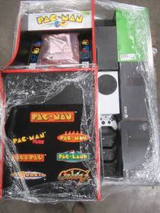 lot 326 image: WHOLESALE MIXED PALLET OF MISCELLANEOUS XBOX SERIES X 1TB, XBOX SERIES S AND PAC MAN 1-UP GAME SYSTEMS - NO RESERVE