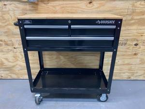 lot 21 image: HUSKY 36 in. W 3-Drawer Rolling Tool Cart in Gloss Black with Hardwood Top