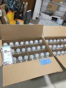 lot 18 image: 2 BOXES OF DEFENDER 16oz HAND SANITIZER