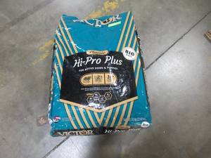 lot 4 image: VICTOR Classic - Hi-Pro Plus Dry Dog Food (approximately 50lbs Bag, Small hole in bag patched)