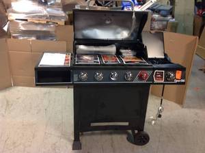 lot 39 image: Dyna Glo 5-Burner Propane Gas Grill in Matte Black with TriVantage Multifunctional Cooking System denteddamaged not used see pictures