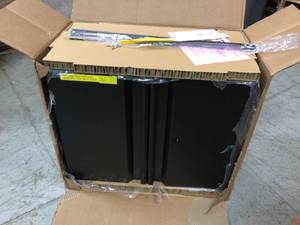 lot 105 image: Husky Heavy Duty Welded 20-Gauge Steel Wall Mounted Garage Cabinet in Black (28 in. W x 22 in. H x 14 in. D) not used see pictures