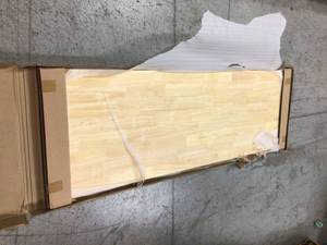 lot 109 image: Husky 72 in. Solid Wood Top for Ready-to-Assemble 6 ft. Adjustable Height Workbench not used see pictures