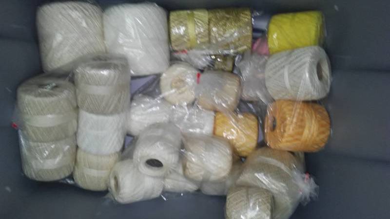 lot 304 image: Crochet and yarn thread rolls.
