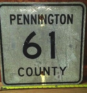 lot 137 image: Road sign Pennington County 61