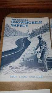 lot 182 image: Snowmobile safety books, tests and more.