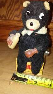 lot 190 image: Vintage Wind Up Bear- Farm Milk Tin Bear