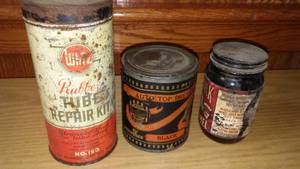 lot 233 image: Vintage automotive cans.
