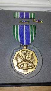 lot 245 image: Military achievement award in case.