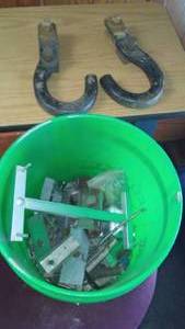 lot 286 image: Tow hooks and bucket of hardware.