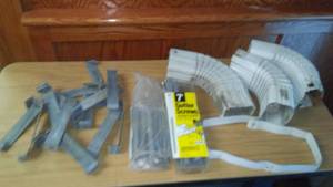 lot 290 image: Gutter elbows, anchor nails and brackets.