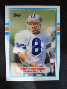 lot 27 image: 1989 Topps Traded Troy Aikman #70T Rookie Card Near Mint Condition