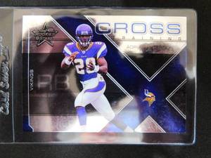 lot 193 image: 2007 Leaf Rookies & Stars Cross Training Adrian Peterson Rookie Card #CT-13 Serial #310500 Mint Condition