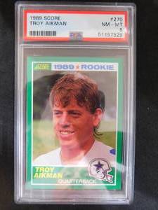 lot 211 image: PSA 8 NM-MT 1989 Score Troy Aikman Rookie Card #270 HOFer