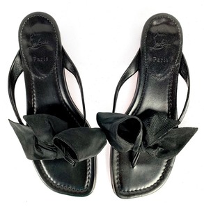 lot 6 image: Christian Louboutin Black Leather Flat Thong Sandals - Size 40