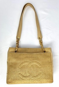 lot 12 image: Chanel Vintage Raffia Woven Grass CC Logo Beige Leather Bag