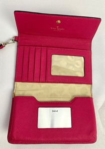 lot 13 image: Kate Spade Fuscia Tri-Fold WalletWristlet