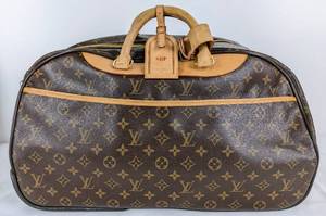 lot 119 image: Louis Vuitton Eole 50 Monogram Canvas Rolling Luggage with Dust Bags
