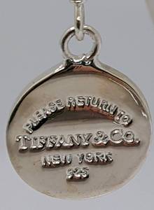 lot 138 image: Tiffany & Co. Signature Sterling Earrings - Silver Round Charms, with Pouch