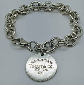 lot 137 image: Tiffany & Co. Signature Sterling Link Bracelet - Sterling Silver Round Tag, with Box