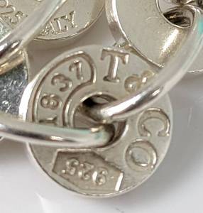 lot 141 image: Tiffany & Co. Sterling Silver 1837 Series Circle Bracelet, with Box and Pouch