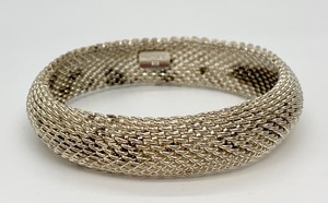 lot 86 image: Tiffany & Co. Sterling Silver Somerset Mesh Bracelet and Sterling Square Stud Earrings with Tiffany Pouches