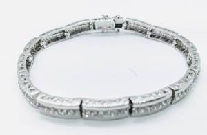 lot 147 image: Sterling Silver and Crystals Side Hearts LL Tennis Bracelet