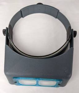 lot 213 image: Two Hobbyist Magnifiers - OptiVisor and Clamping Lamp