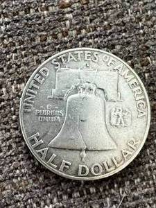 lot 64 image: 1957 United States Ben Franklin Silver Half Dollar