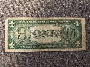 lot 146 image: 1935 A One Dollar Red Seal Hawaii Silver Certificate