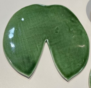 lot 233 image: Pottery Basket and Lily Pads