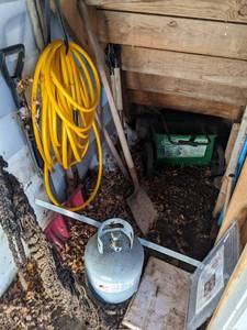 lot 120 image: Misc lot includes a hose, empty pro...