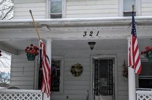 lot 163 image: 2 flagpoles and flags, mounts are N...