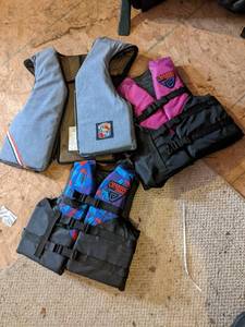 lot 225 image: (3) Life Vests See Photos for Sizi...