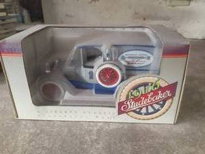 lot 71 image: 1916 Studebaker bank, New in box...