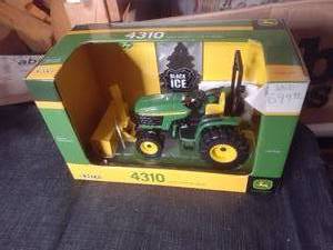 lot 293 image: Ertl John Deere 4310 With Snowplow in Box