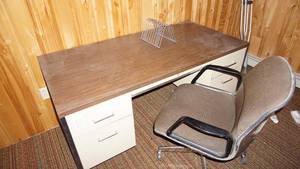lot 8 image: White Desk W Wood Grain Formica Top--Five Drawers W Key Lock--Desk Chair On Casters--Wire File Holder