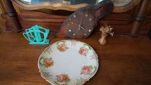 lot 27 image: Four Collectible Items--Wooden Battery Operated Clock--A Small Wooden Vase W Dried Flowers In It--A Collectible Plate W5 Roses On It-(Silesia)--A Turquoise Napkin Holder