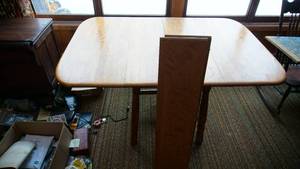 lot 32 image: Wooden Kitchen Table That Folds Down On Each Side--Plus Two Extra Leafs Or Leaves
