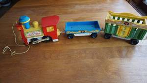 lot 53 image: Three Piece Circus Train Pull Toy