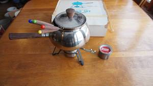 lot 55 image: Gourmet International 18-8 Stainless Steel Fondue Set W 4 Forks--Can Of Sterno Canned Heat Cooking Fuel