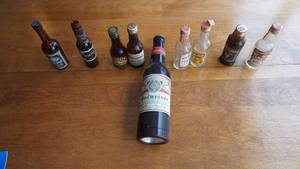 lot 57 image: Nine Collectable Liquor Bottles