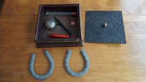 lot 63 image: Square Collectible Box With Lid Filled With Two Horseshoes--Docs Place In Lake Benton, Minnesota Item, Etc.