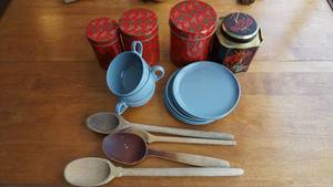 lot 72 image: Three Light Blue Melamine Coffee Cups & Five Melamine Salad Plates--Four Wooden Spoons--Three Red Tin Canisters W Lids--One Decorative Container W Lid