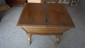 lot 82 image: Wooden Coffee Table With Top That Opens Up For Storage Inside--Has Four Decorative Ornate Legs