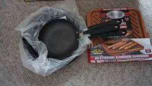 lot 83 image: Gotham No Sticking Aluminum Cookware--(Oven Safe Up To 500 Degrees--Dishwasher Safe)--Reversible Double Grill & Griddle & Three Frying Pans