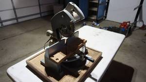 lot 111 image: Rockwell International Motorized Miter Box--Model #34-010--Seriel # MA4877--115V AC--10-5A--25-60 HERTZ--Carbide Tipped Saw Blade